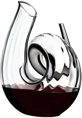 Riedel Decanter Curly Fatto A Mano lets you decant a young bottle of Cabernet for an enhanced flavor. Made from fine crystal, this carafe has a quirky curl shape that is great to use for everyday or a special occasion - 2011/00